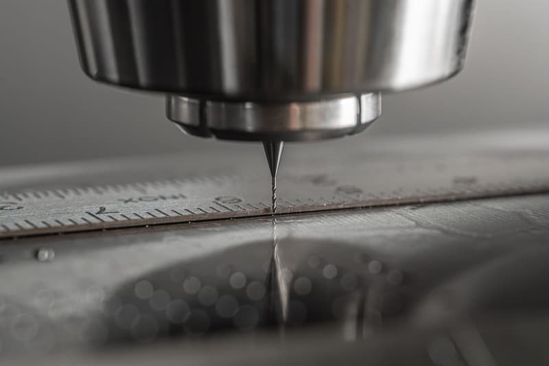 Close-up of a CNC milling cutter working a metal surface